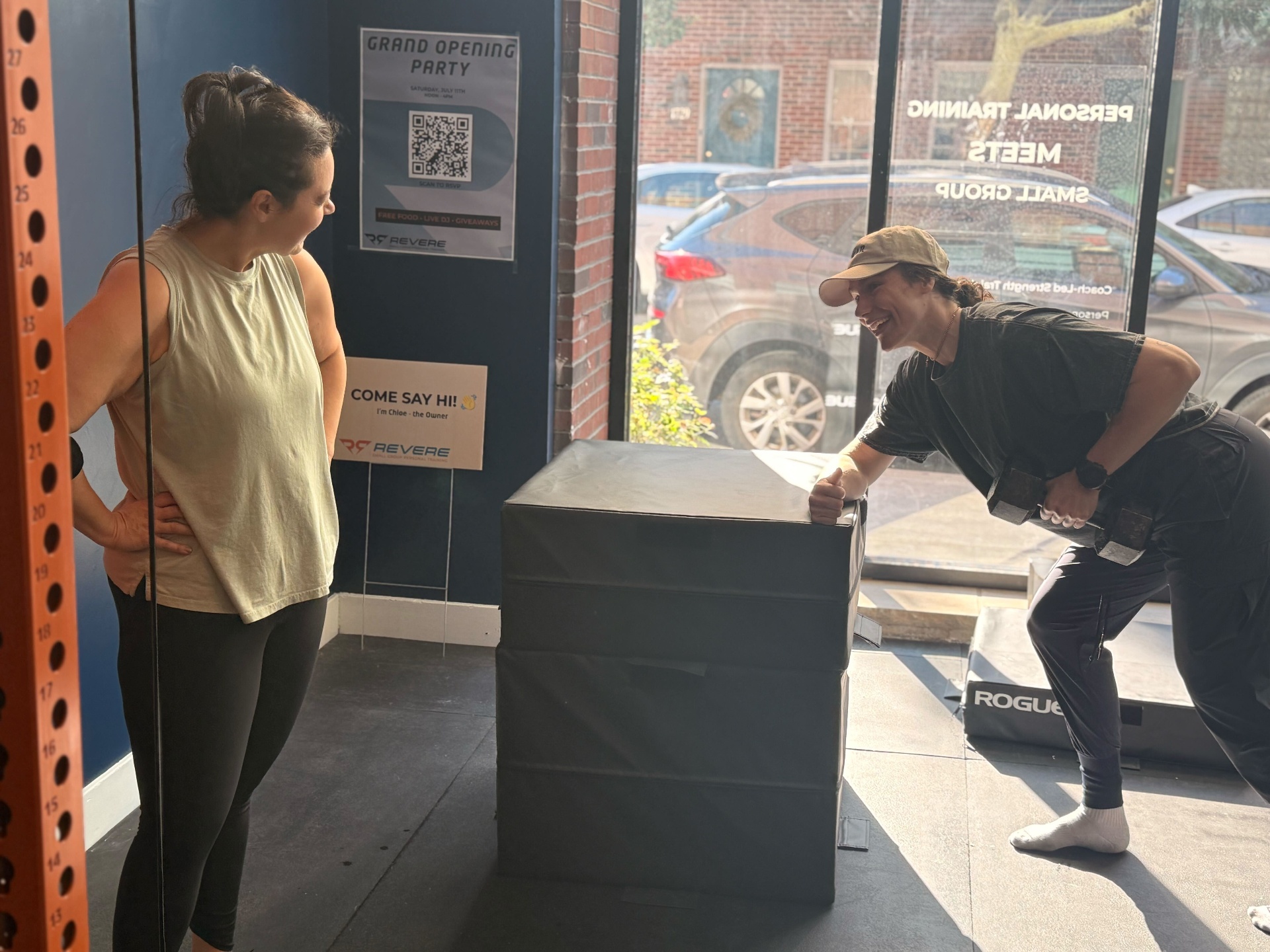 Chloe, founder of Revere, greeting a member at the studio